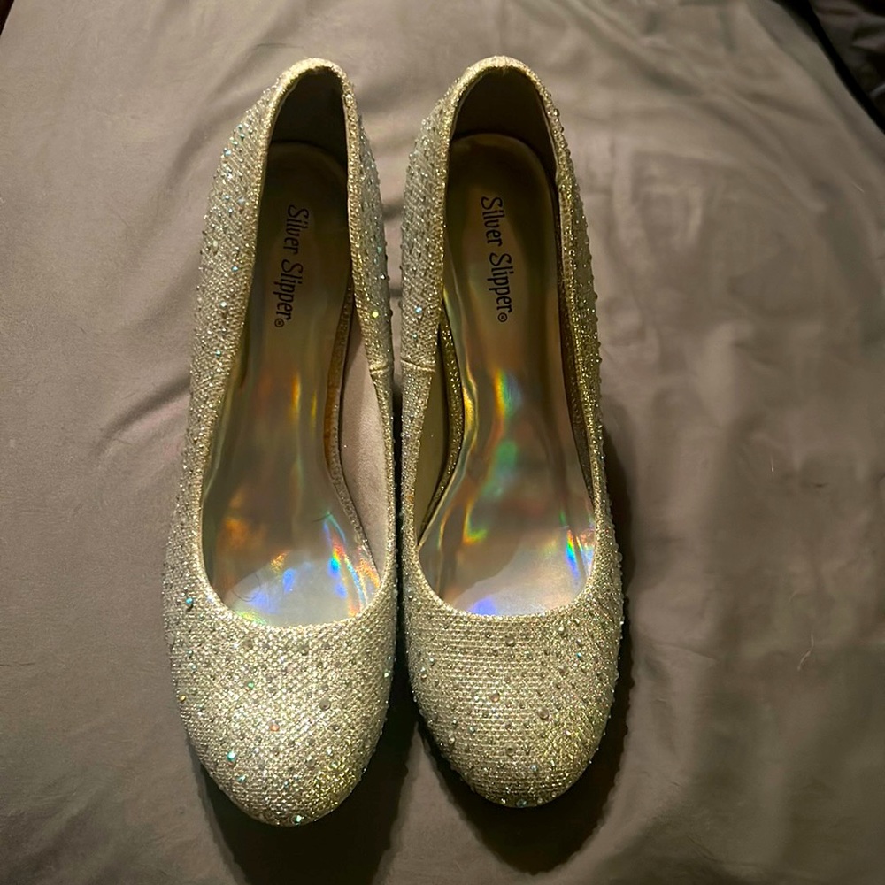 Razzle Dazzle pumps only worn once. Great condition!